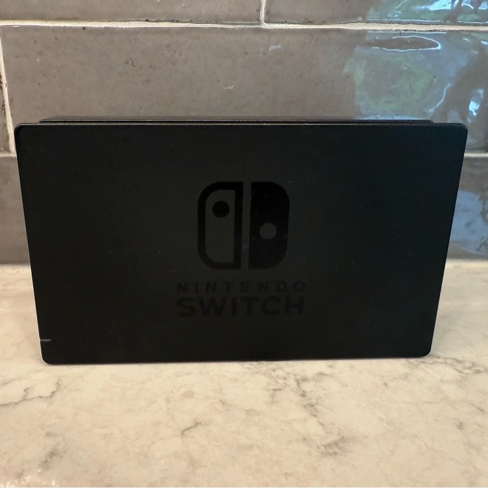 Nintendo Switch Console w/ Game, Case, Dock, and Joy-Cons.